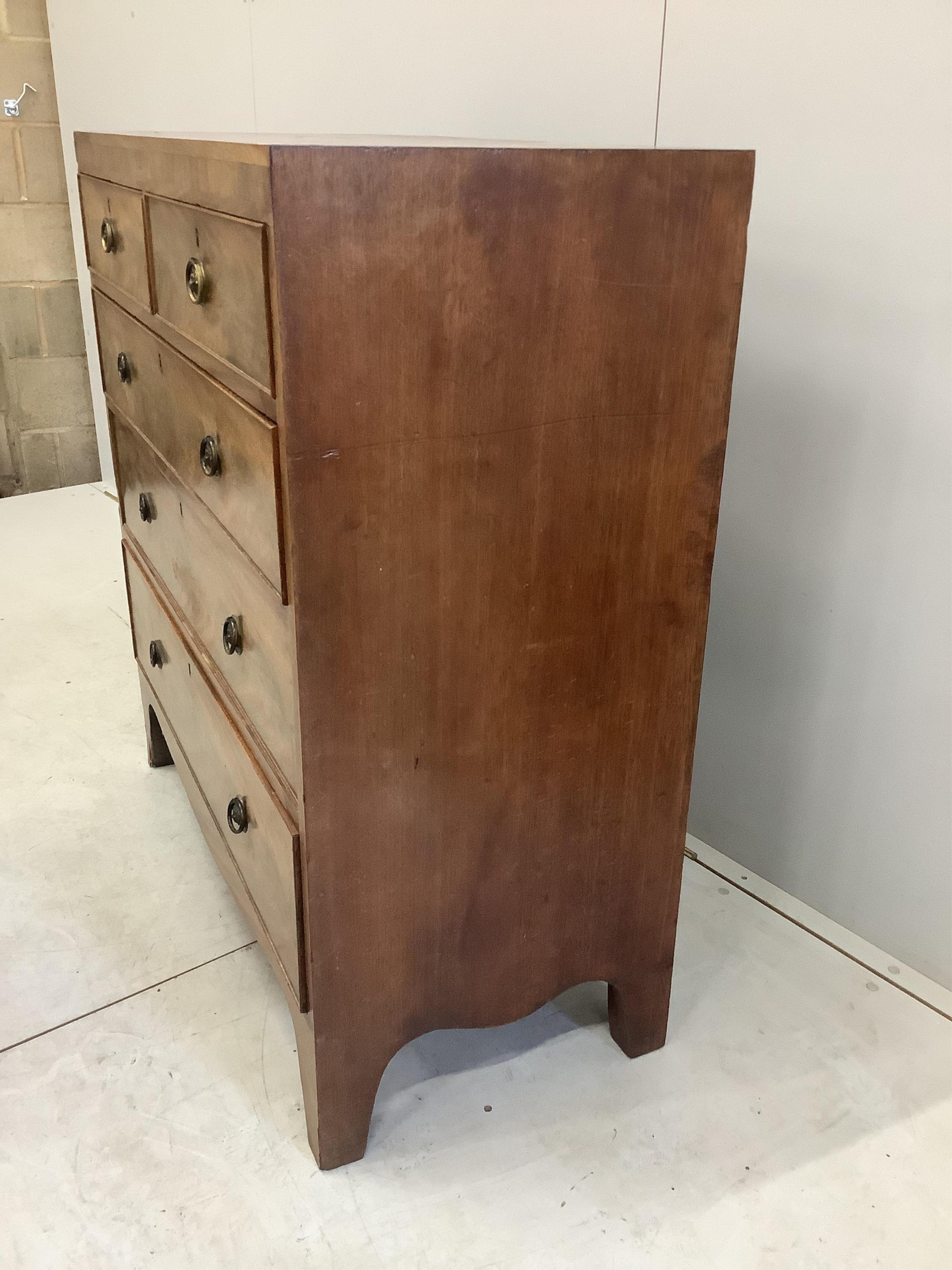 A Regency mahogany and rosewood banded chest of five drawers, width 104cm, height 109cm. Condition - a little faded and rubbed to the top, otherwise fair